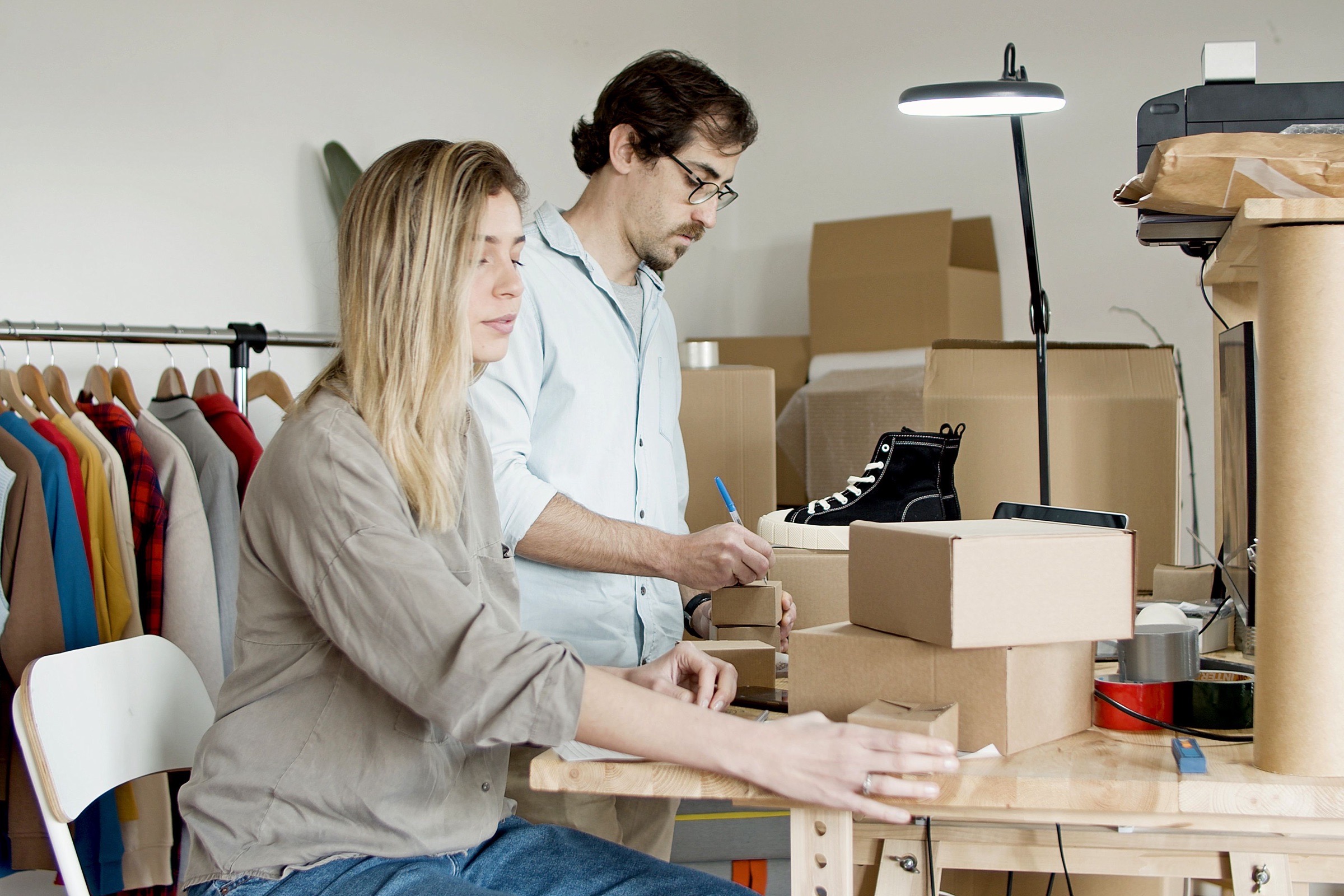 Business partners working together on products and ecommerce fulfilment